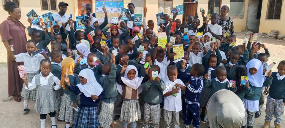 Students and Teachers with Books and Supplies